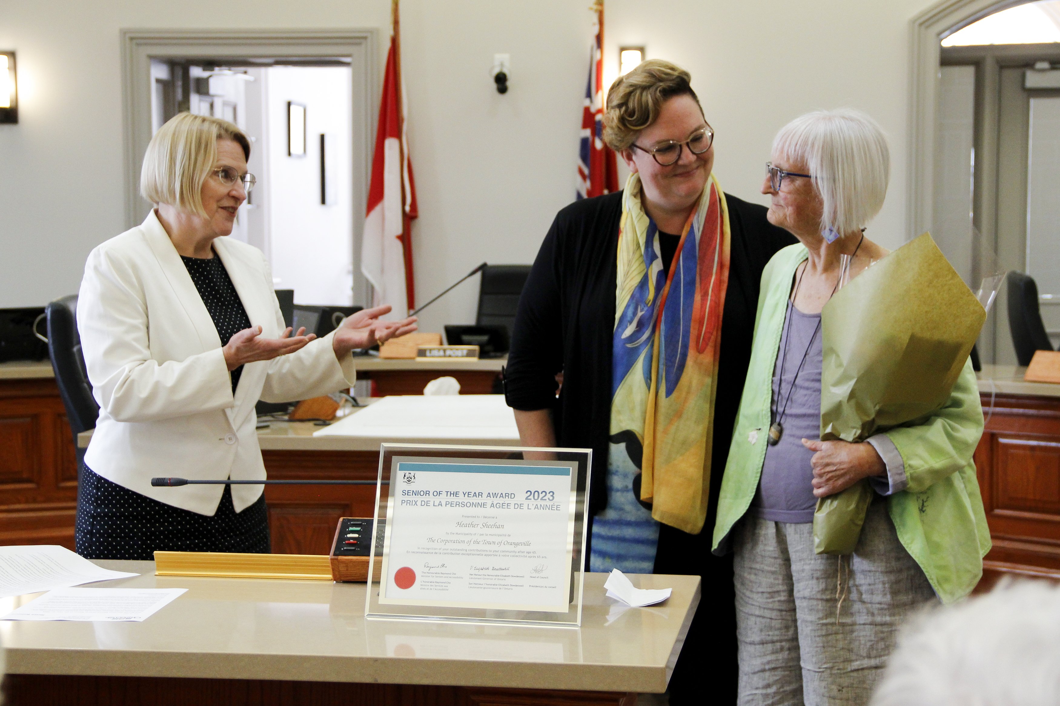 MPP Sylvia Jones and Mayor Lisa Post congratulate Heather Sheehan for the Ontario Senior of the Year Award.